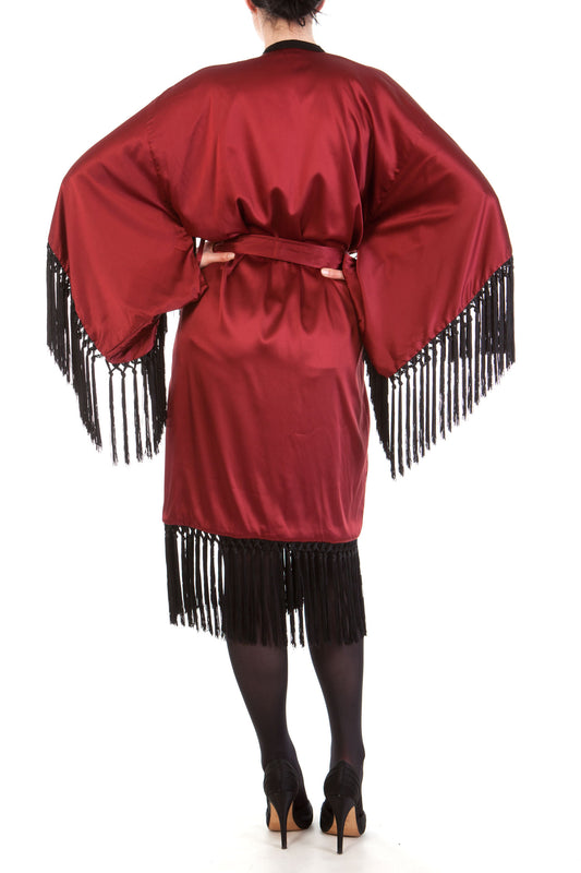 Red silk robe with black knotted fringing, back view